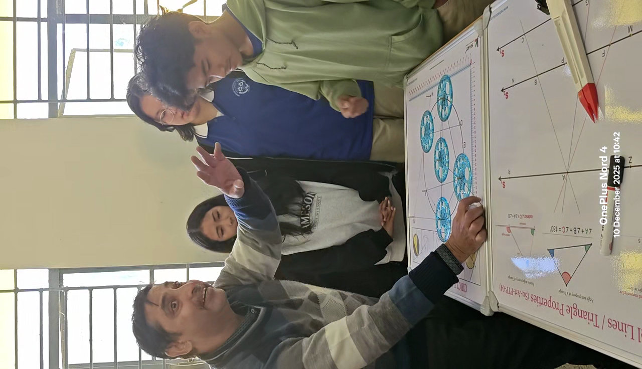 Student explaining Circle Theorems to peers